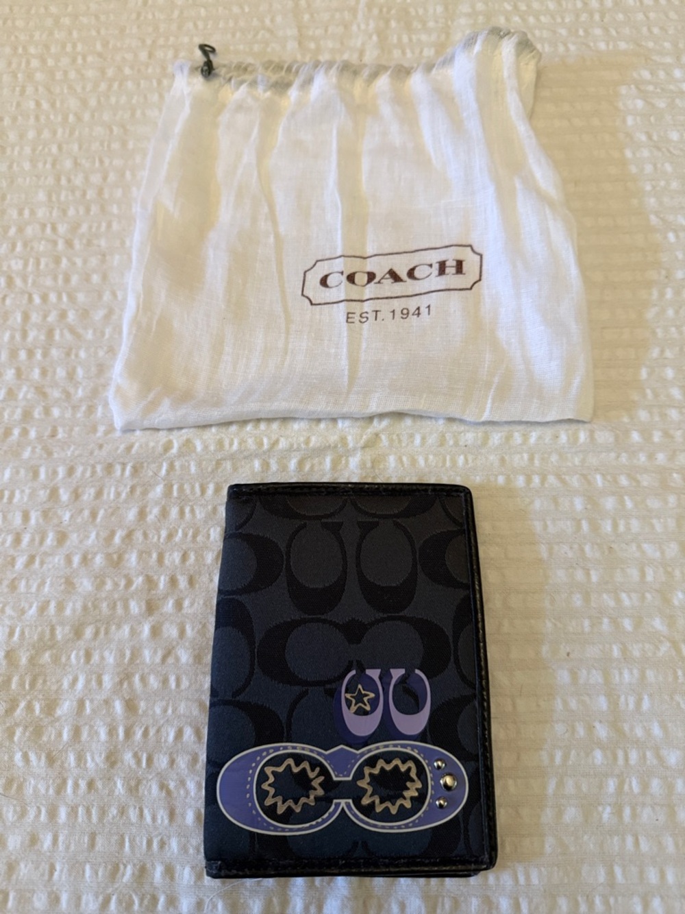 Coach Black Signature Passport Wallet with Purple Patches and silver studs